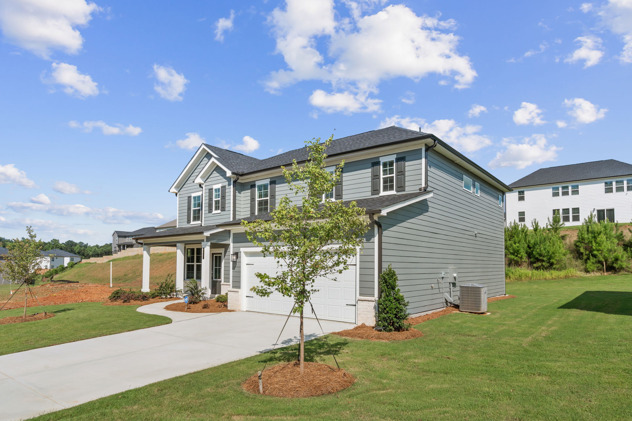 A house with a large front yard.
