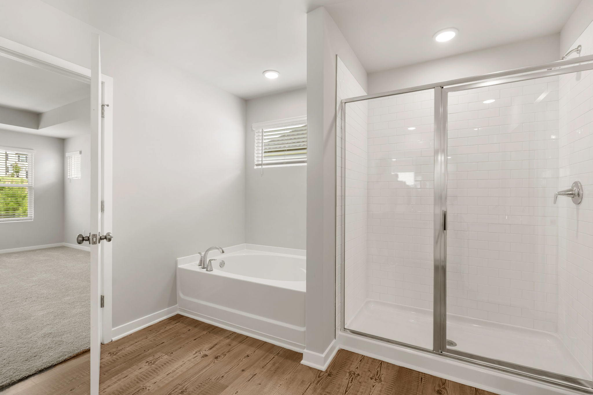 A bathroom with a glass shower.