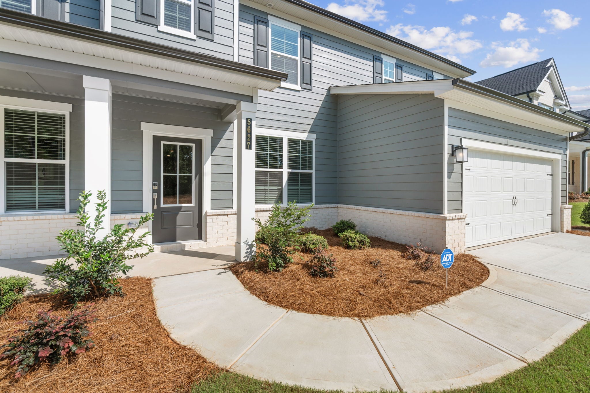 A house with a driveway.