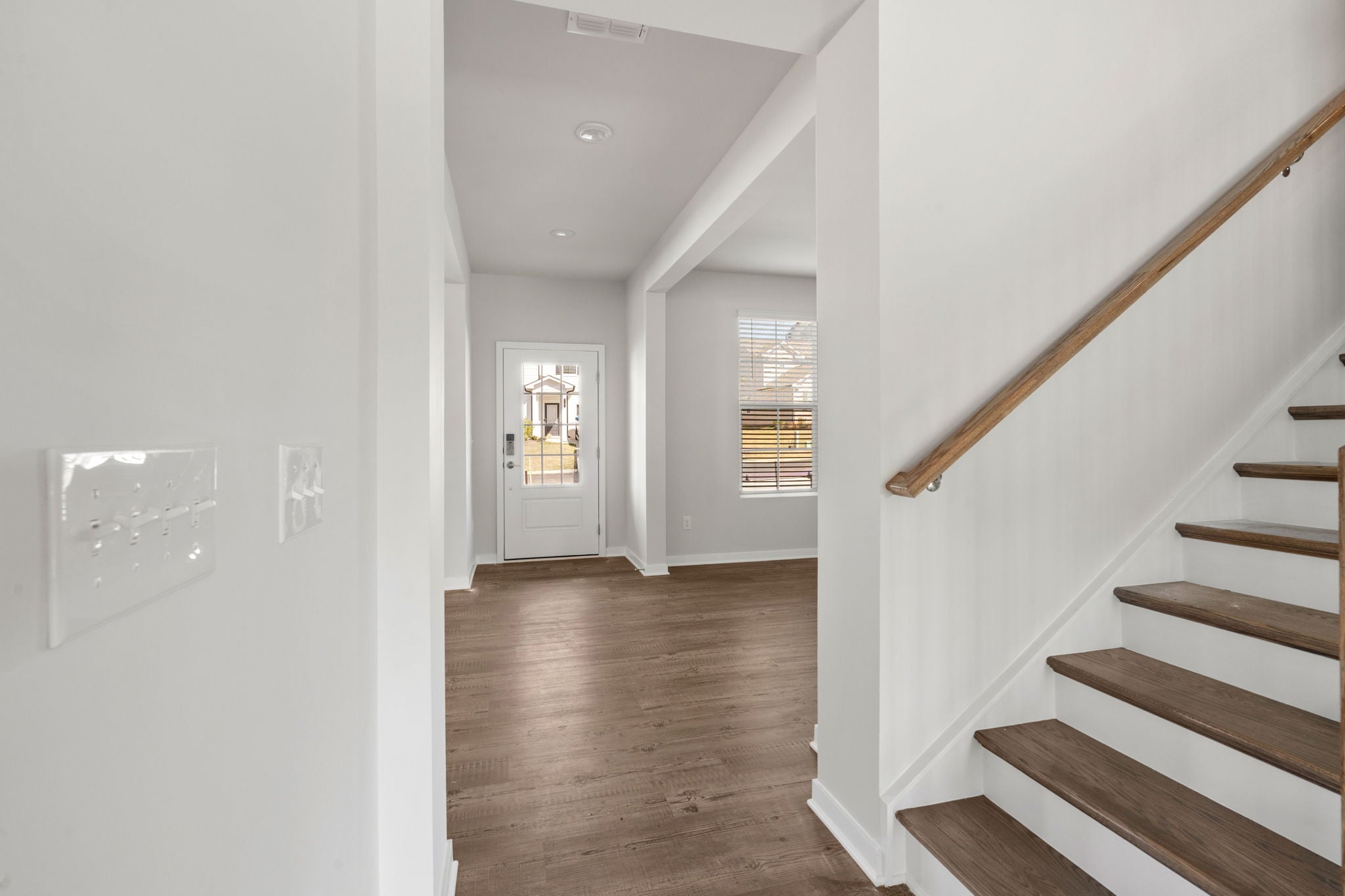 A staircase leading to a door.