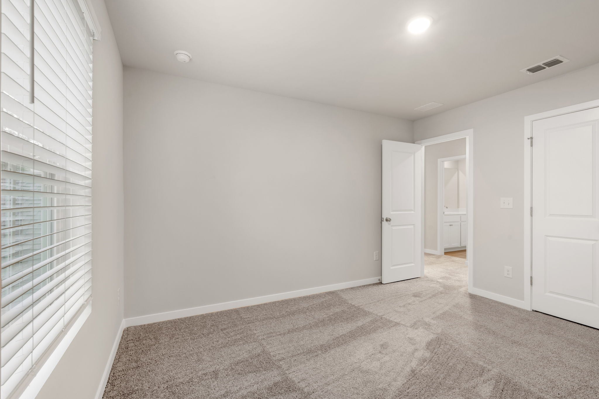 A room with white doors.
