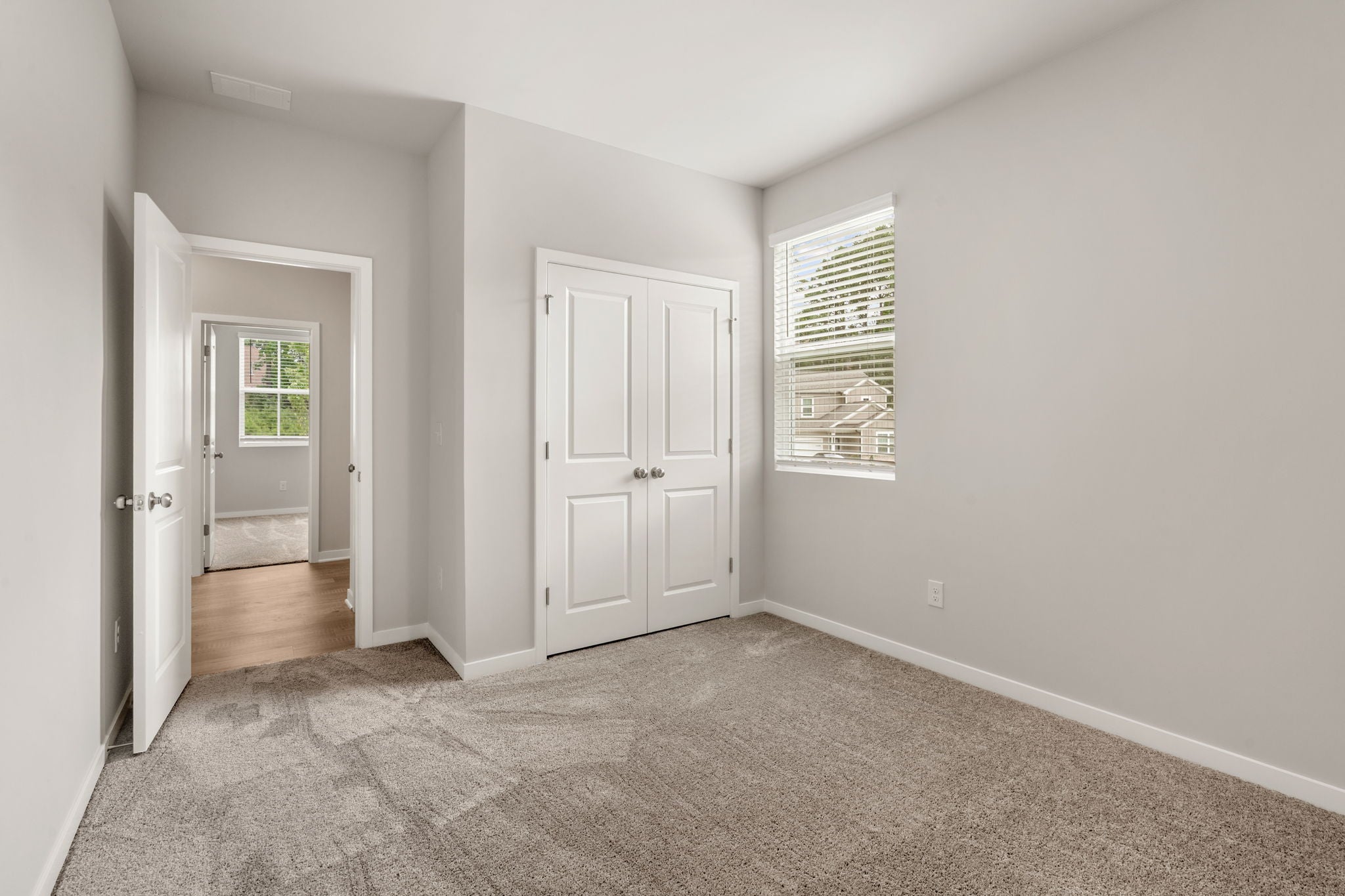 A room with white doors.