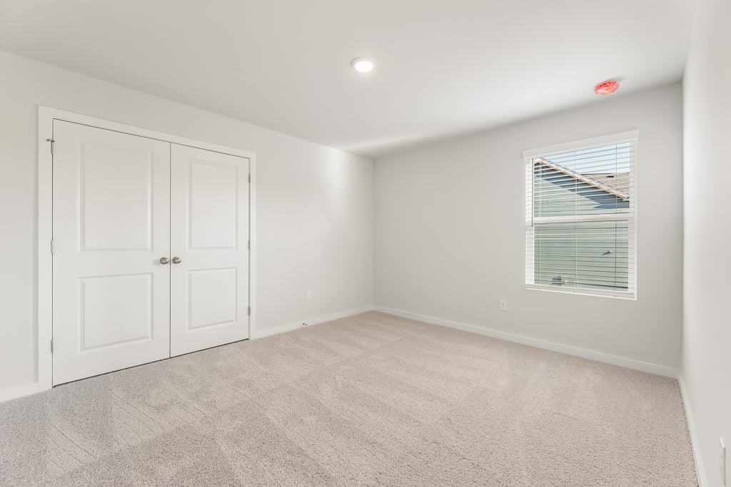 A room with white doors.