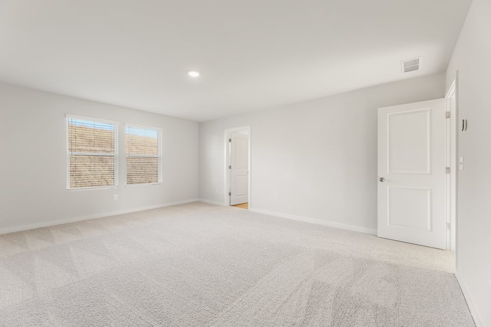 A room with white doors.
