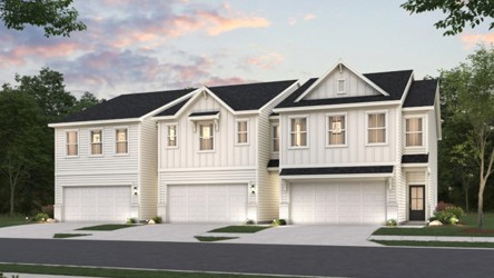 A large house with a driveway.