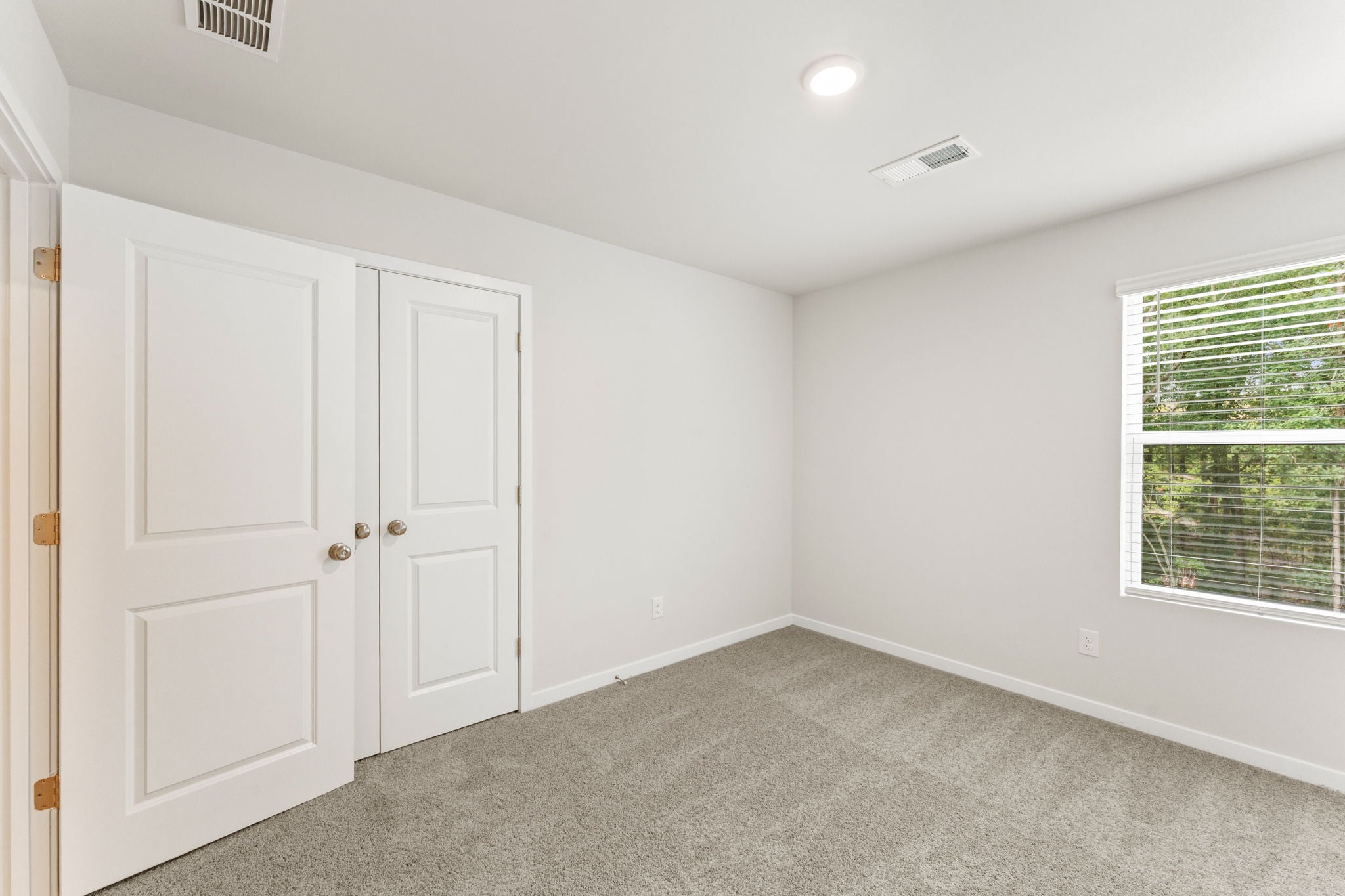 A room with white doors.