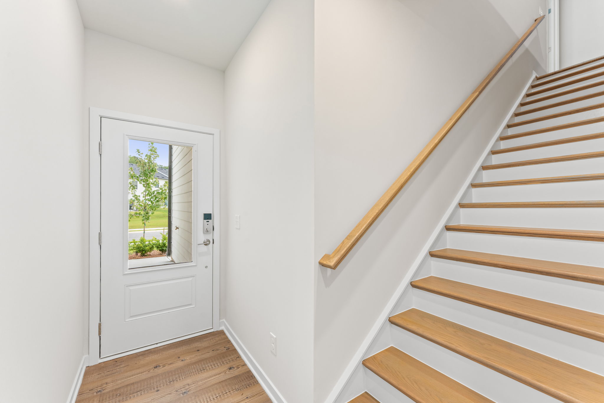 A staircase leading to a door.