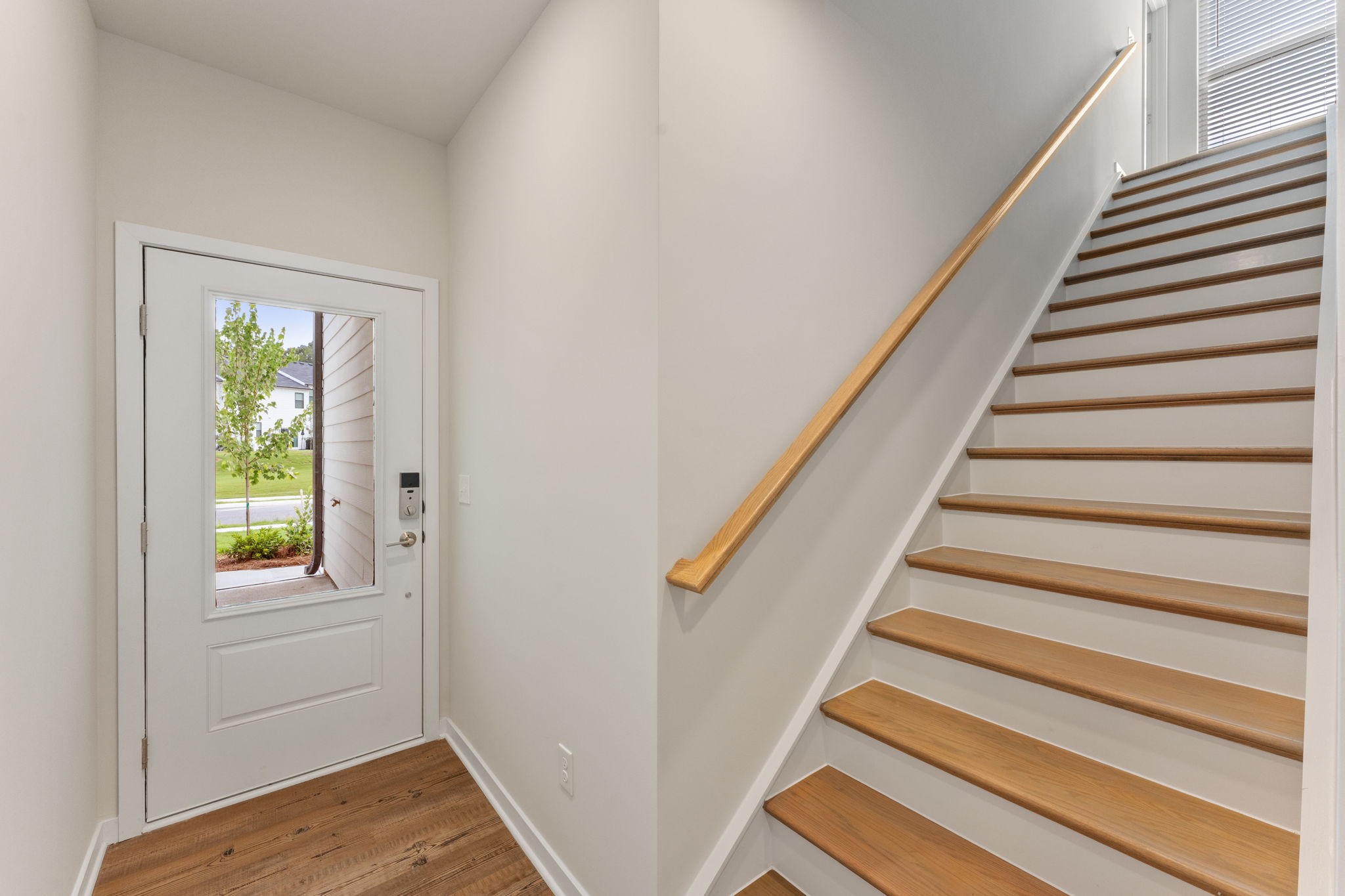 A staircase leading to a door.