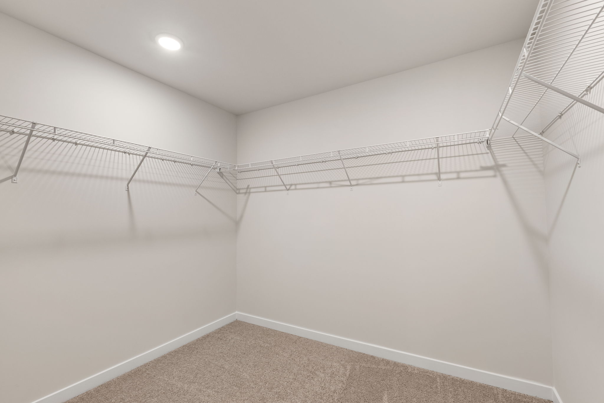 A white room with a white wall.