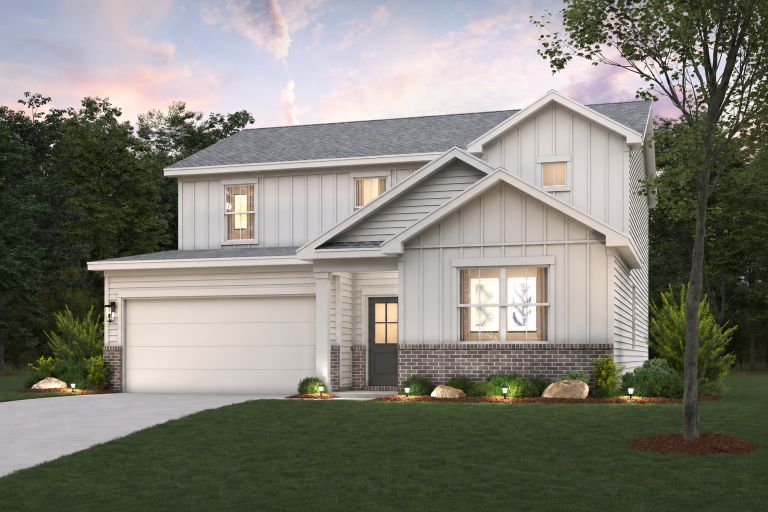 A house with a large front yard.
