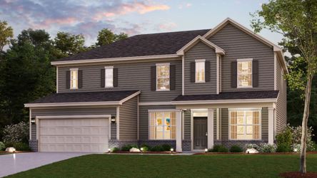 A house with a lawn in front of it.