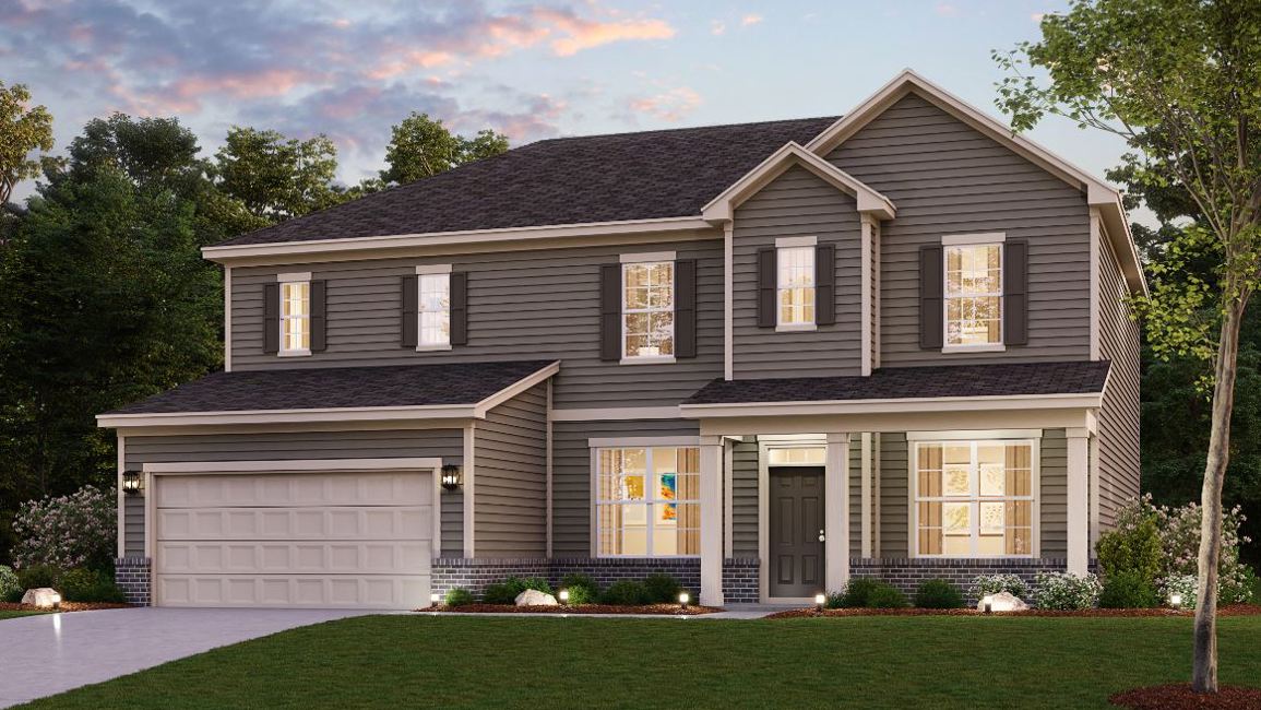 A house with a lawn in front of it.