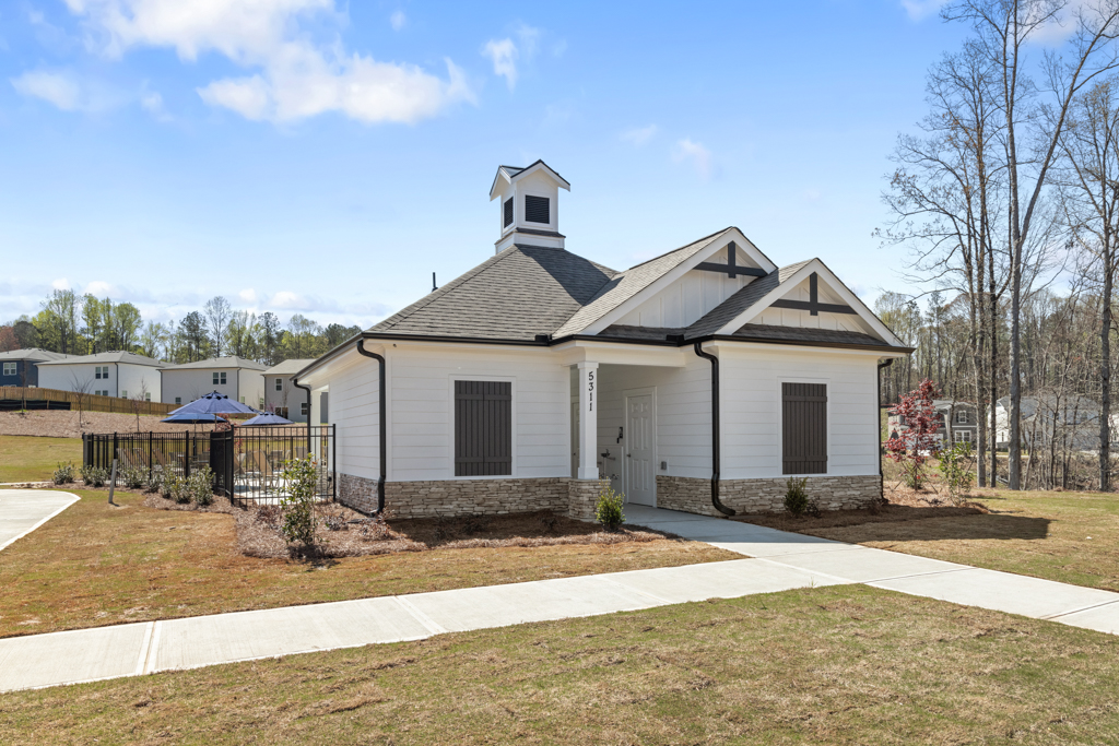 A house with a fence around it.