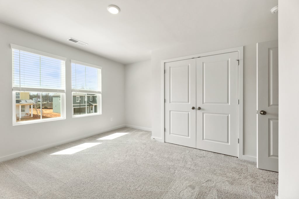 A room with white doors.