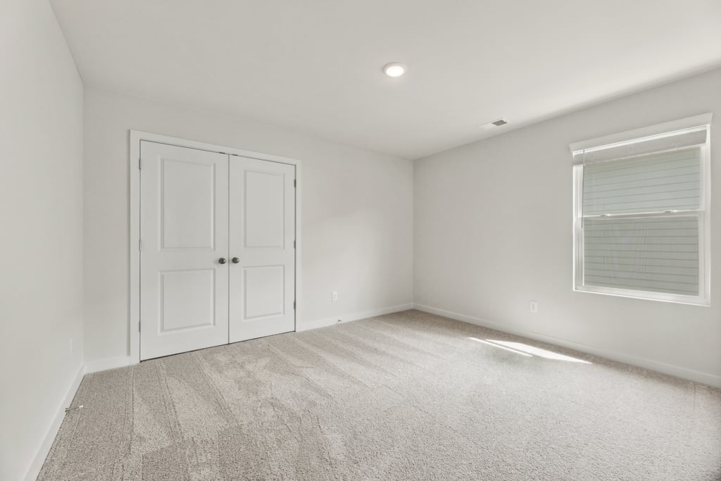 A room with white doors.