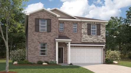 A brick house with a garage.