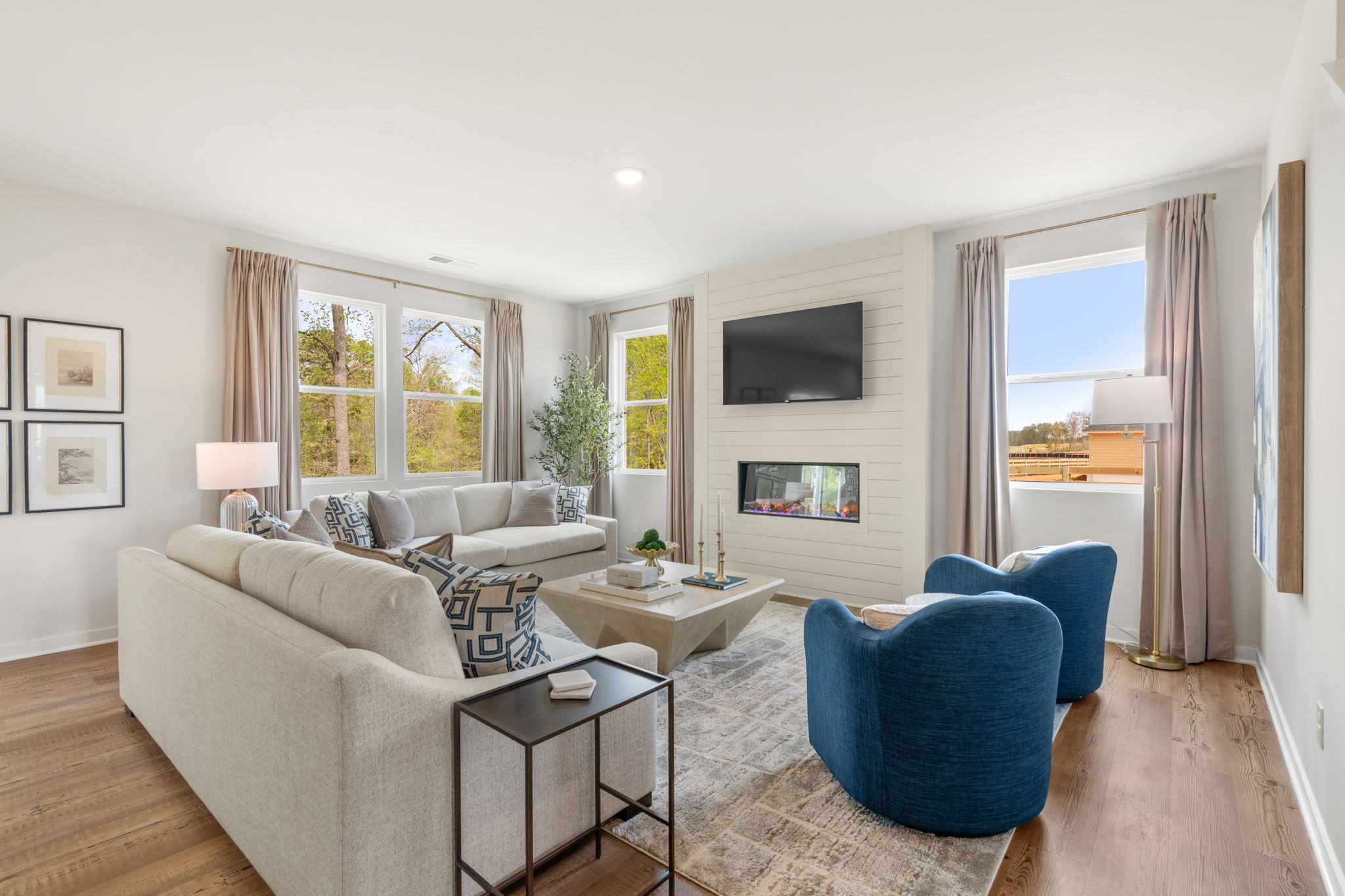 A living room with a fireplace.