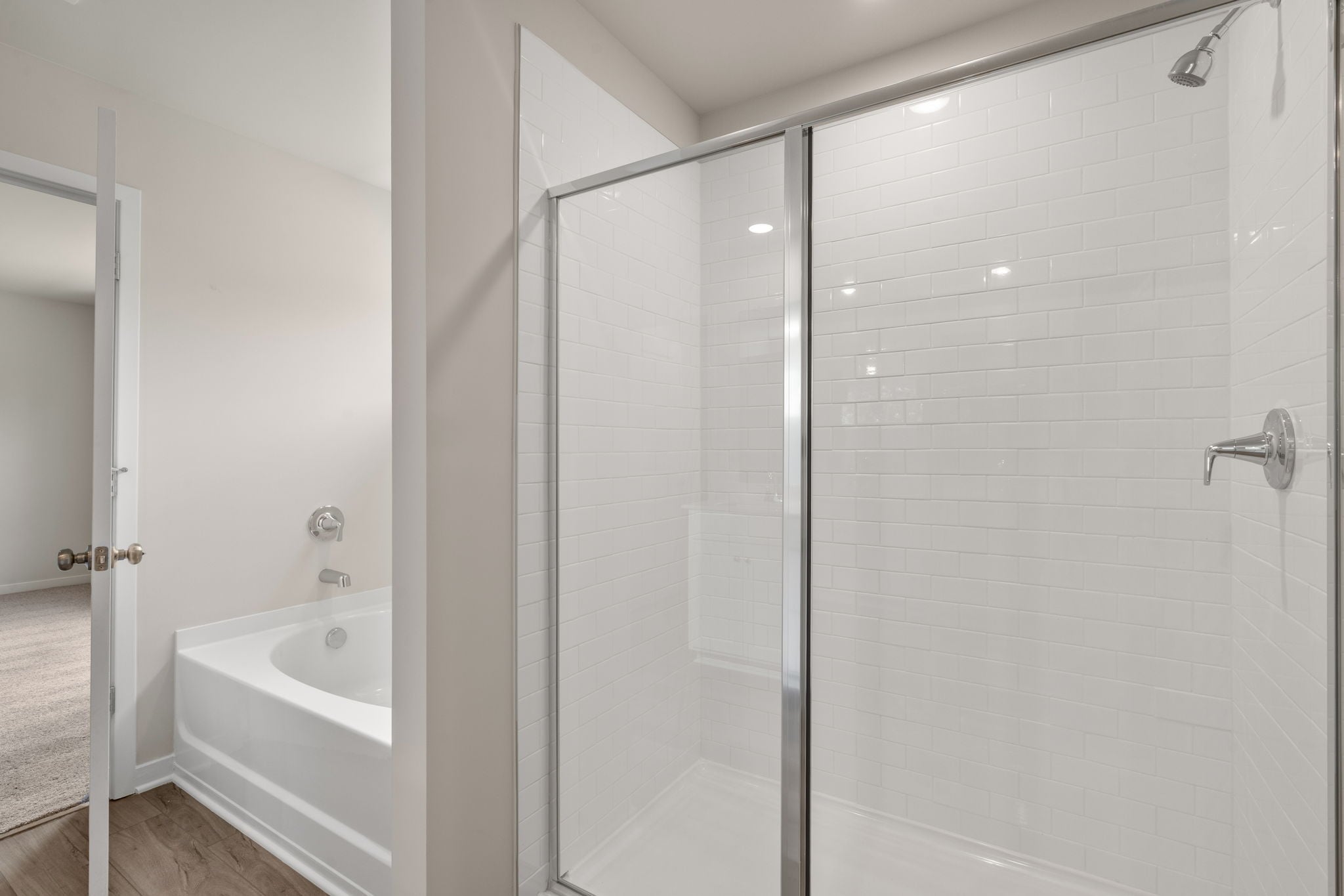A bathroom with a glass shower.