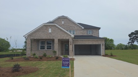 A house with a driveway.