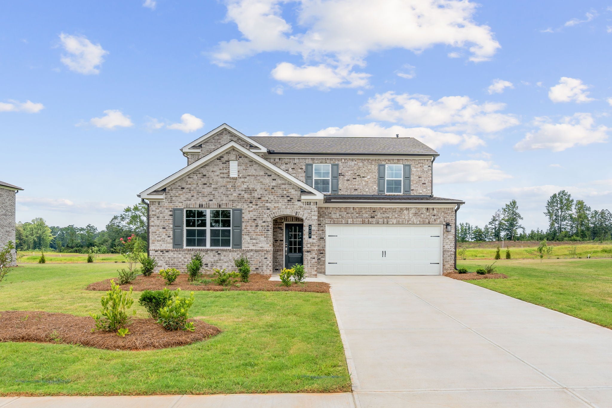A house with a driveway.