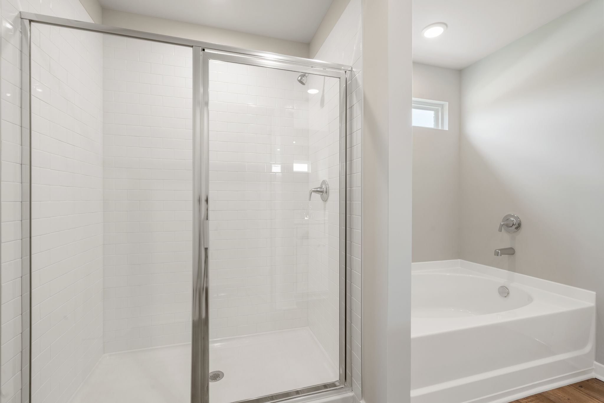 A bathroom with a glass shower.