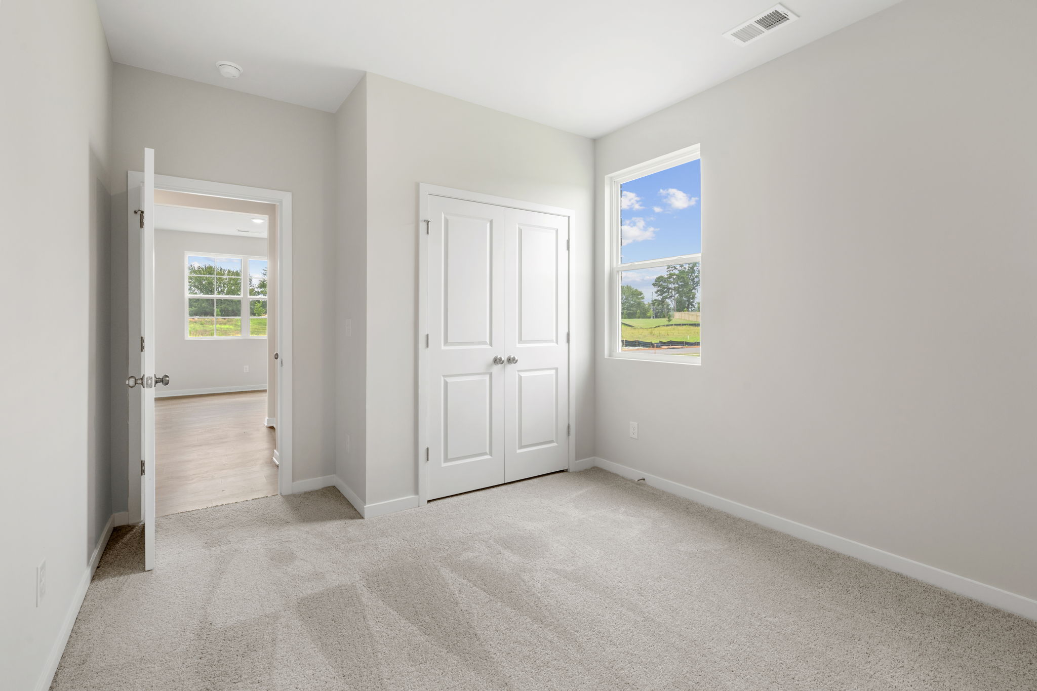 A room with white doors.