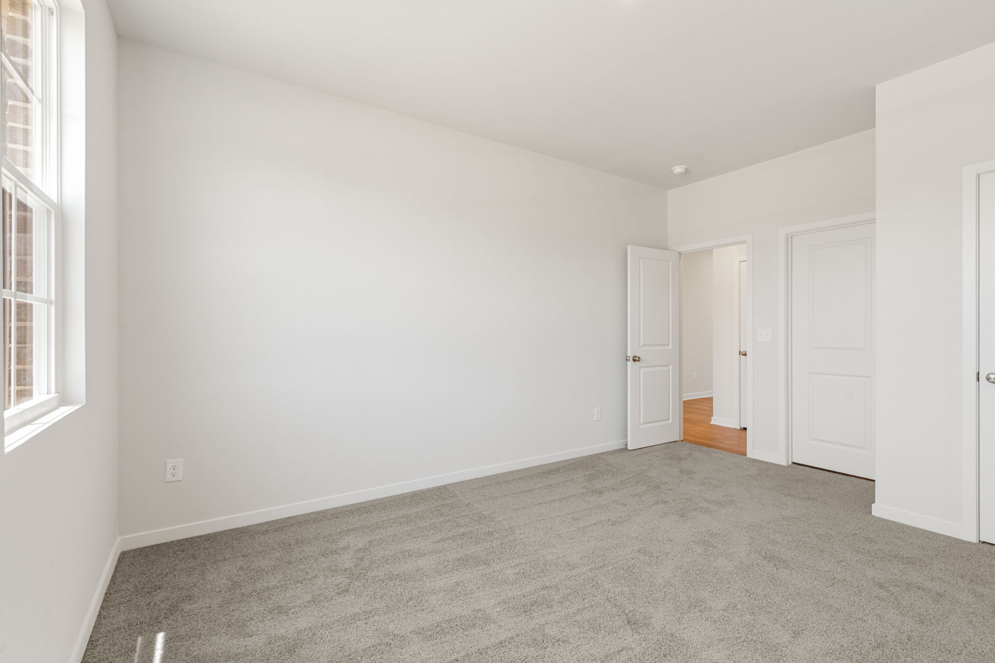 A room with white doors.