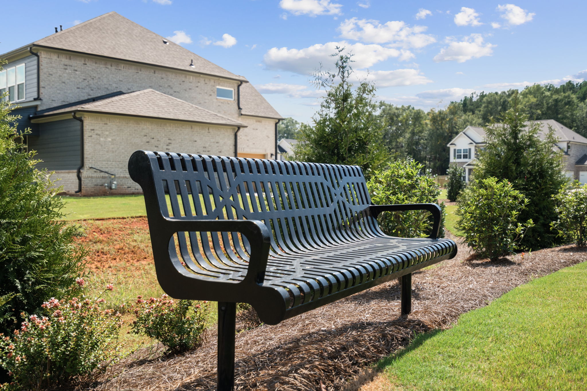 A bench in a garden.