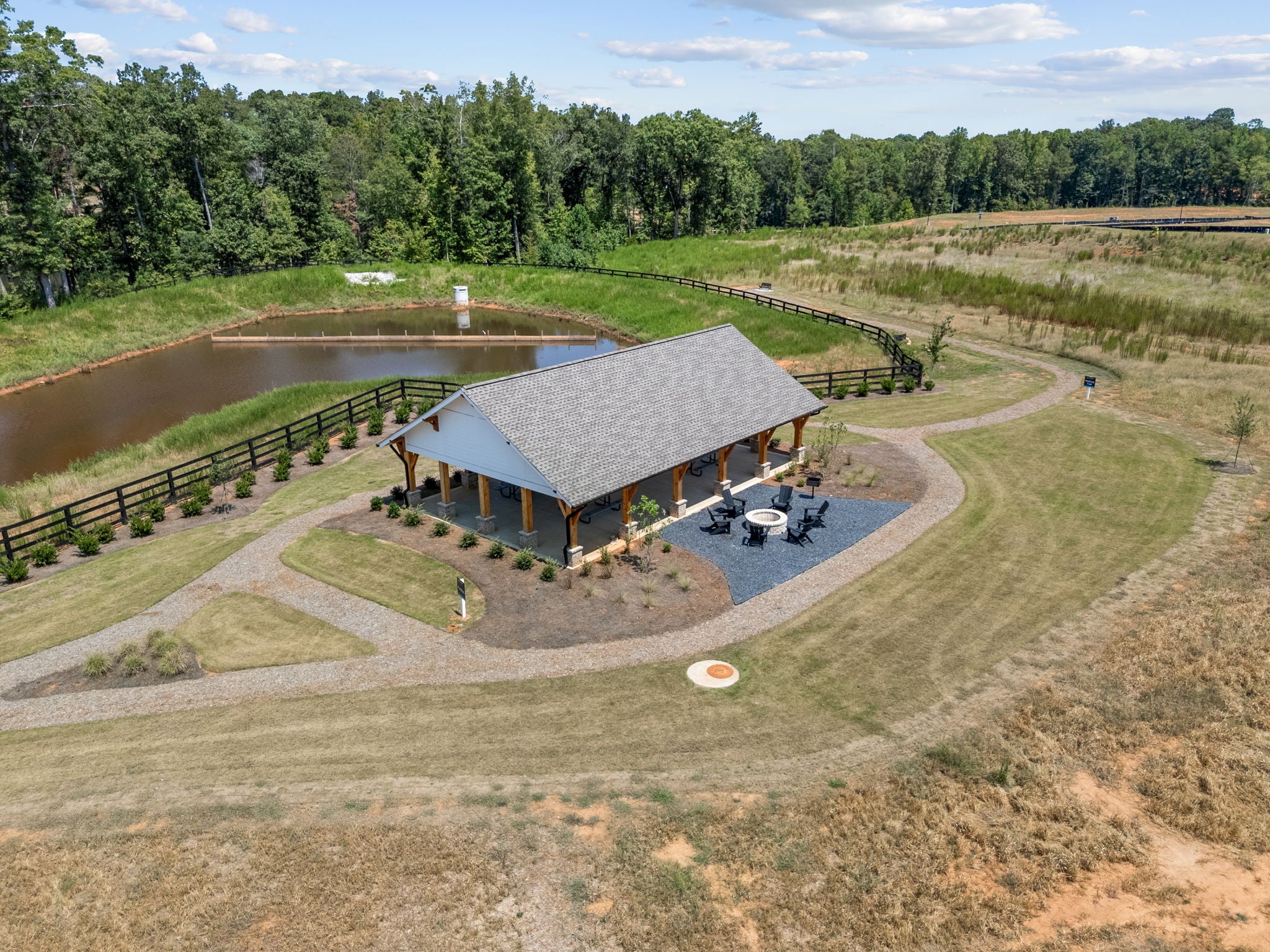 A house on a dirt field.