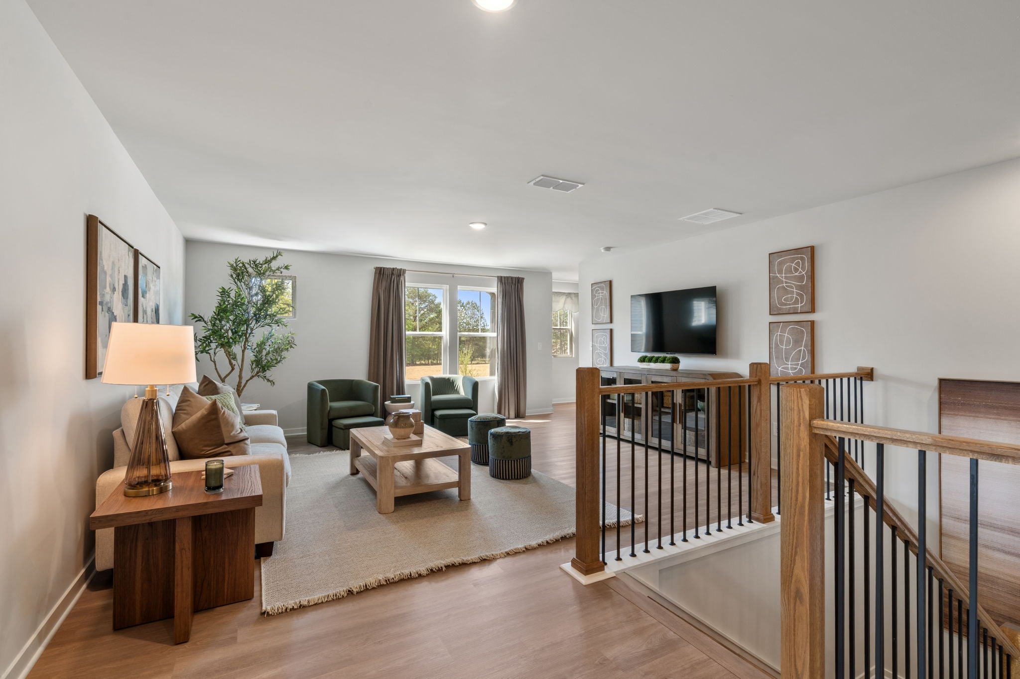 A living room with a wood floor.