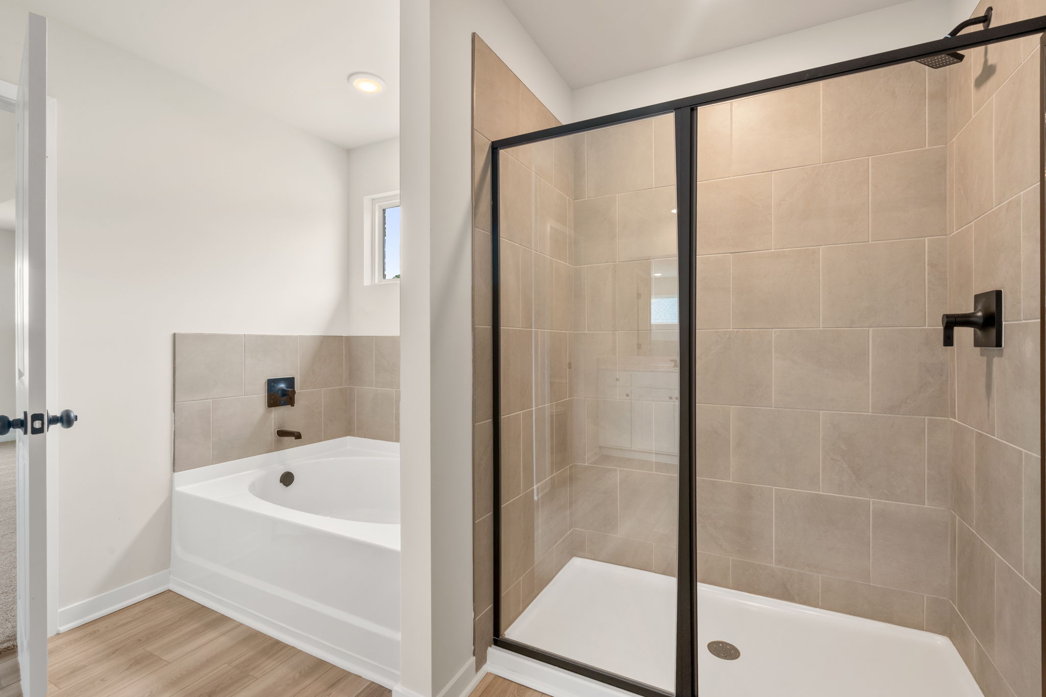 A bathroom with a glass shower.
