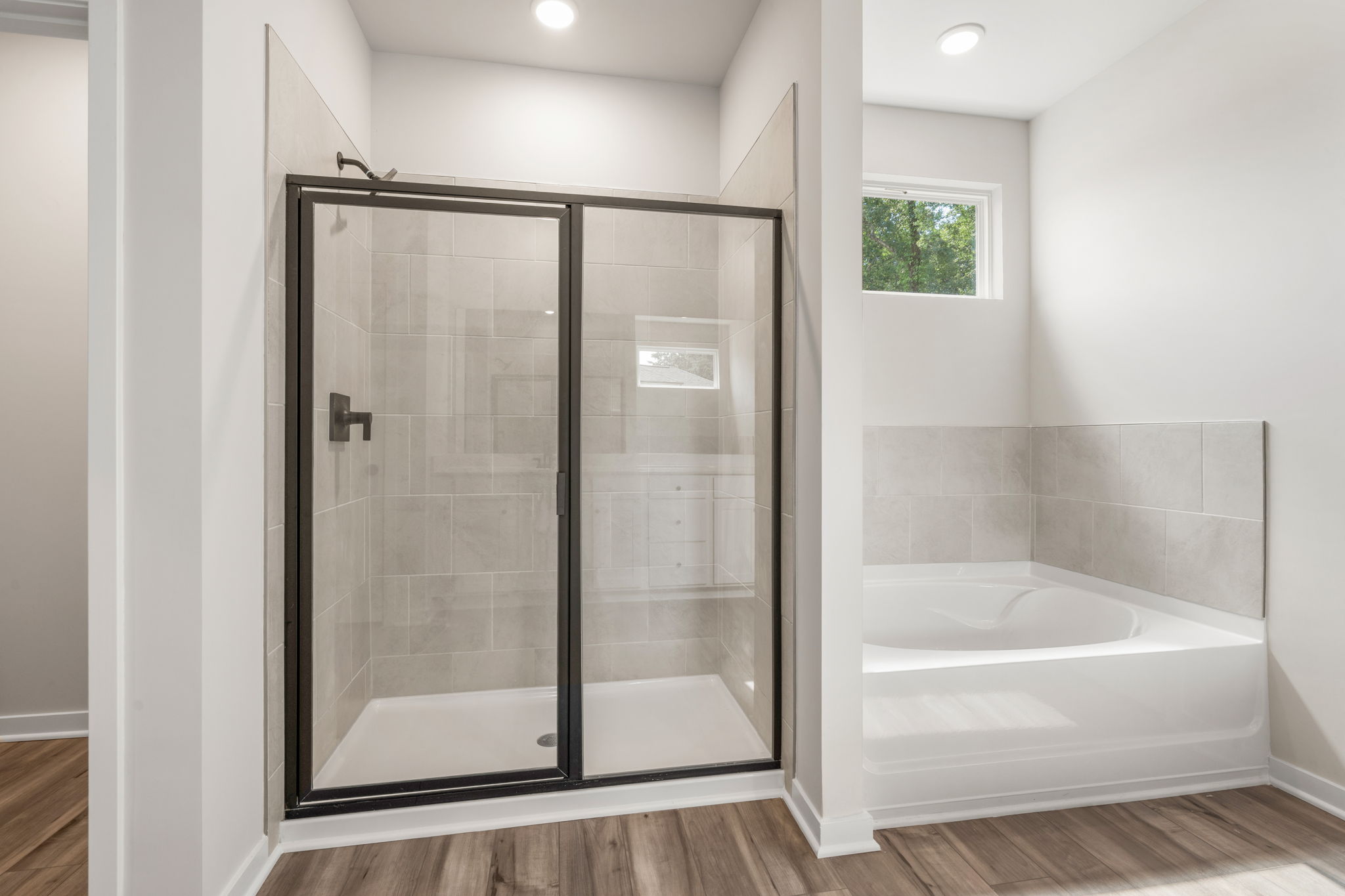 A bathroom with a glass shower.