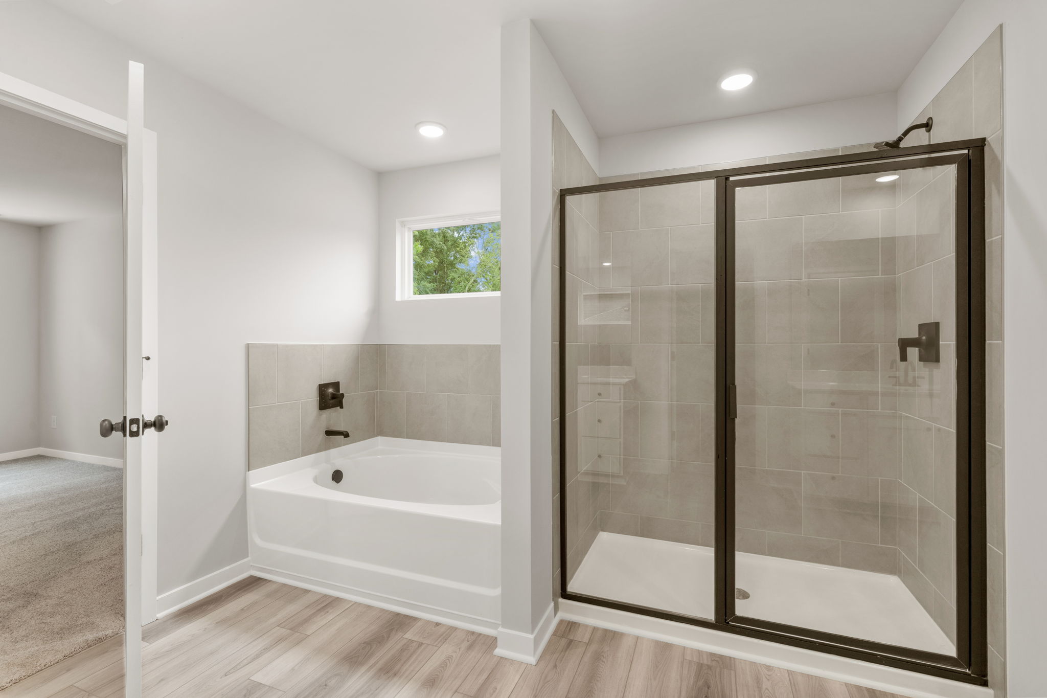 A bathroom with a glass shower.
