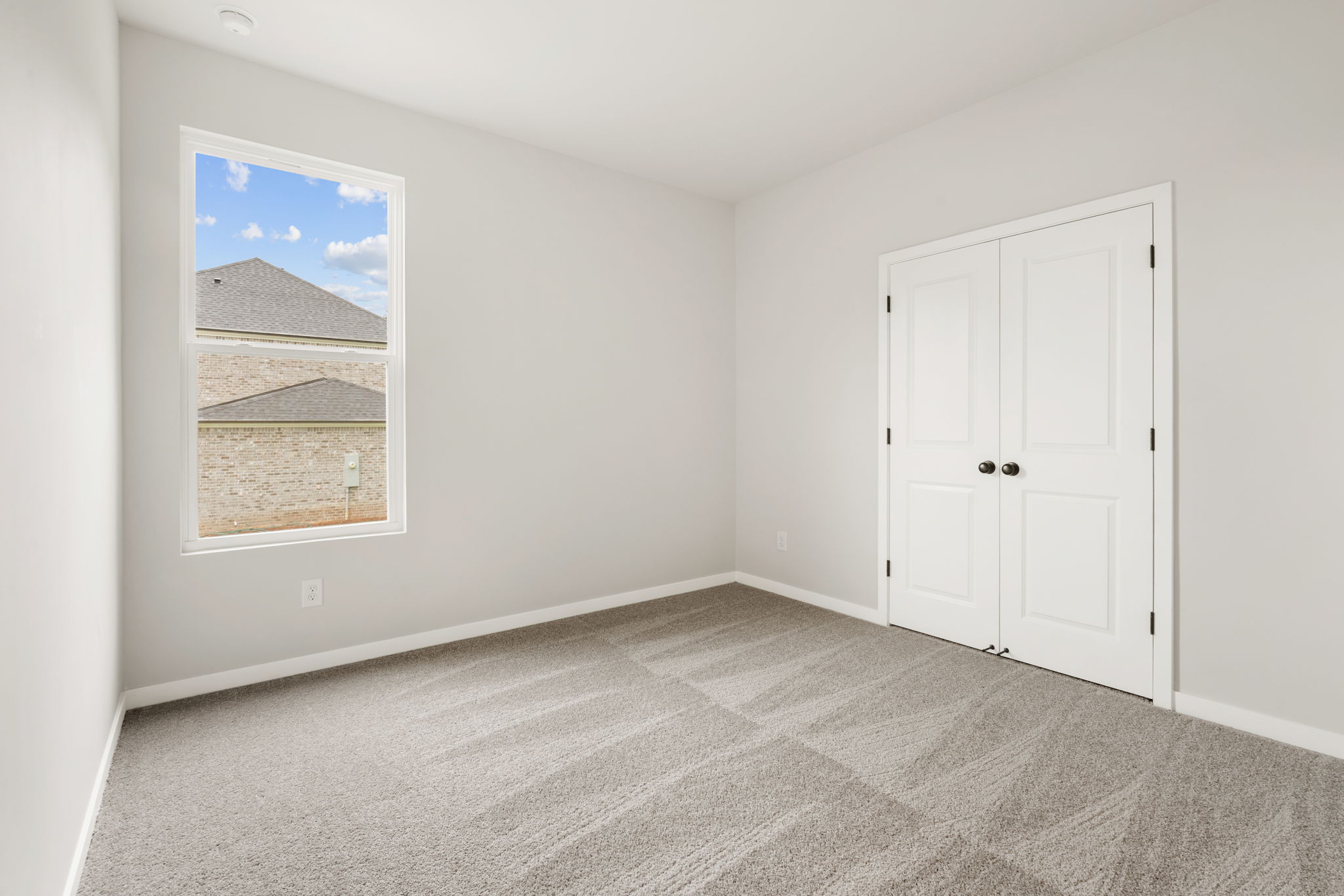 A room with white doors.