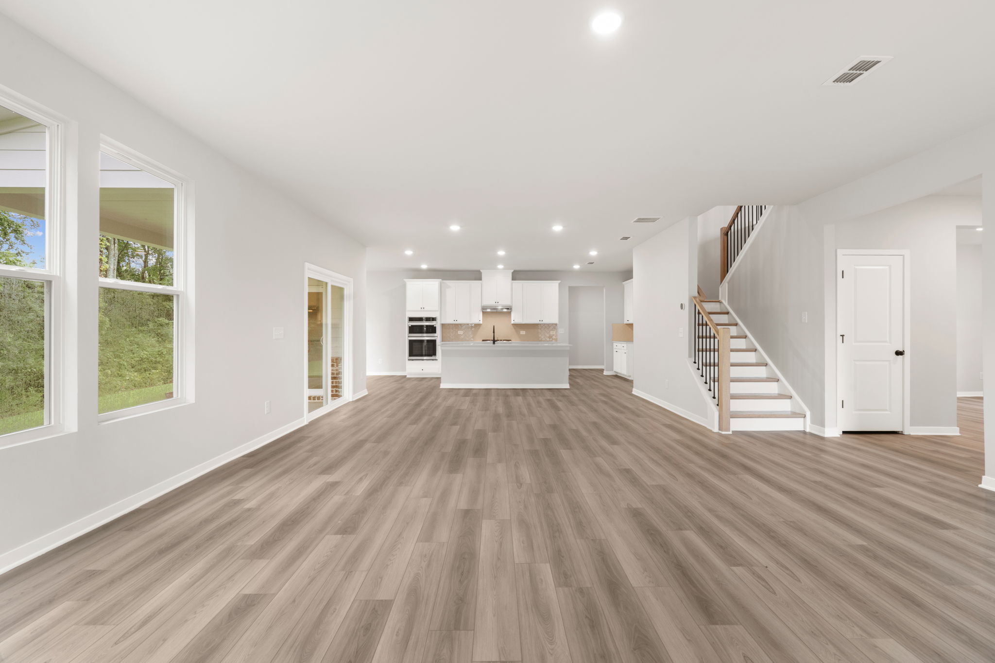 A large empty room with white walls.