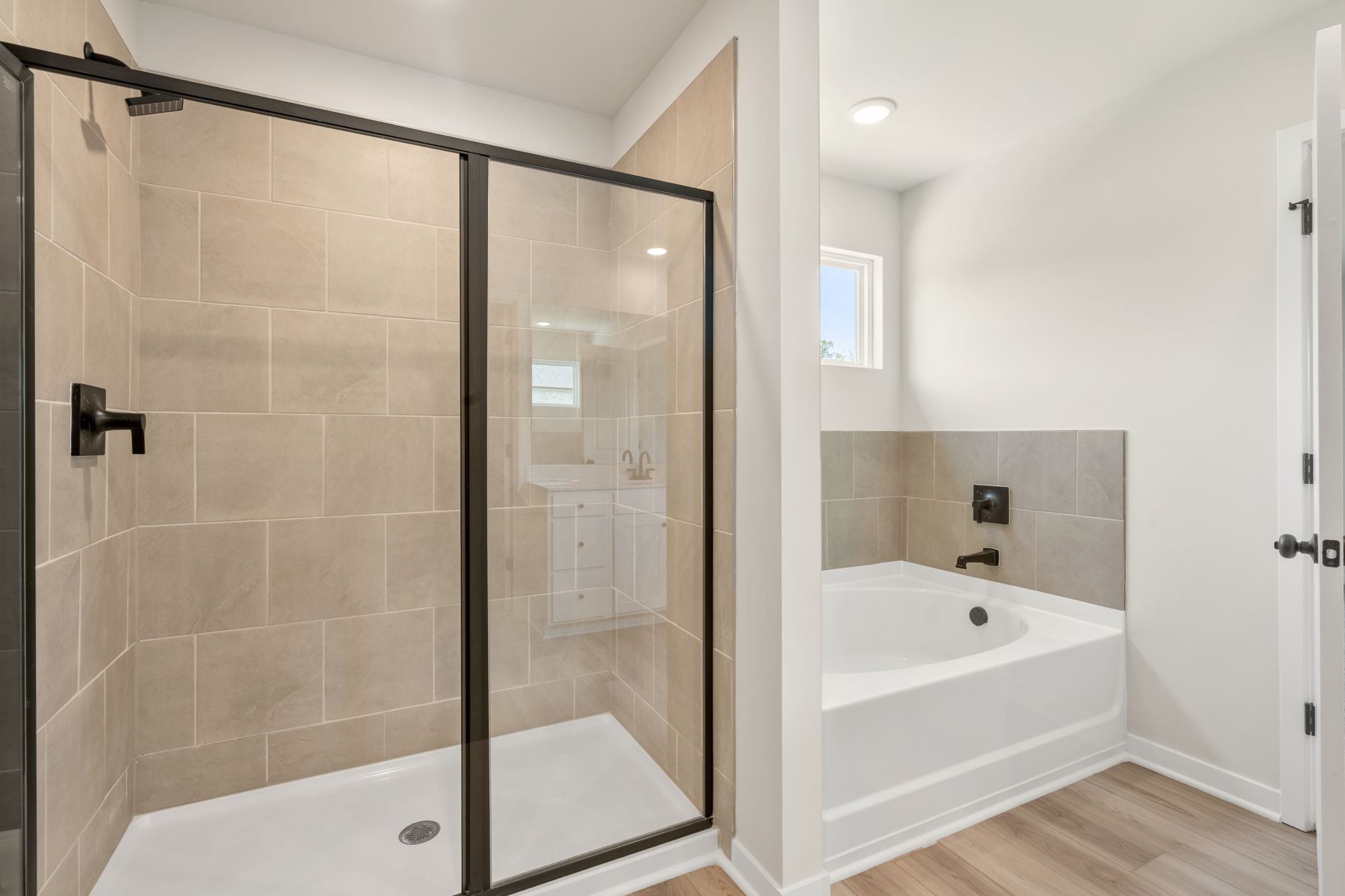A bathroom with a glass shower.