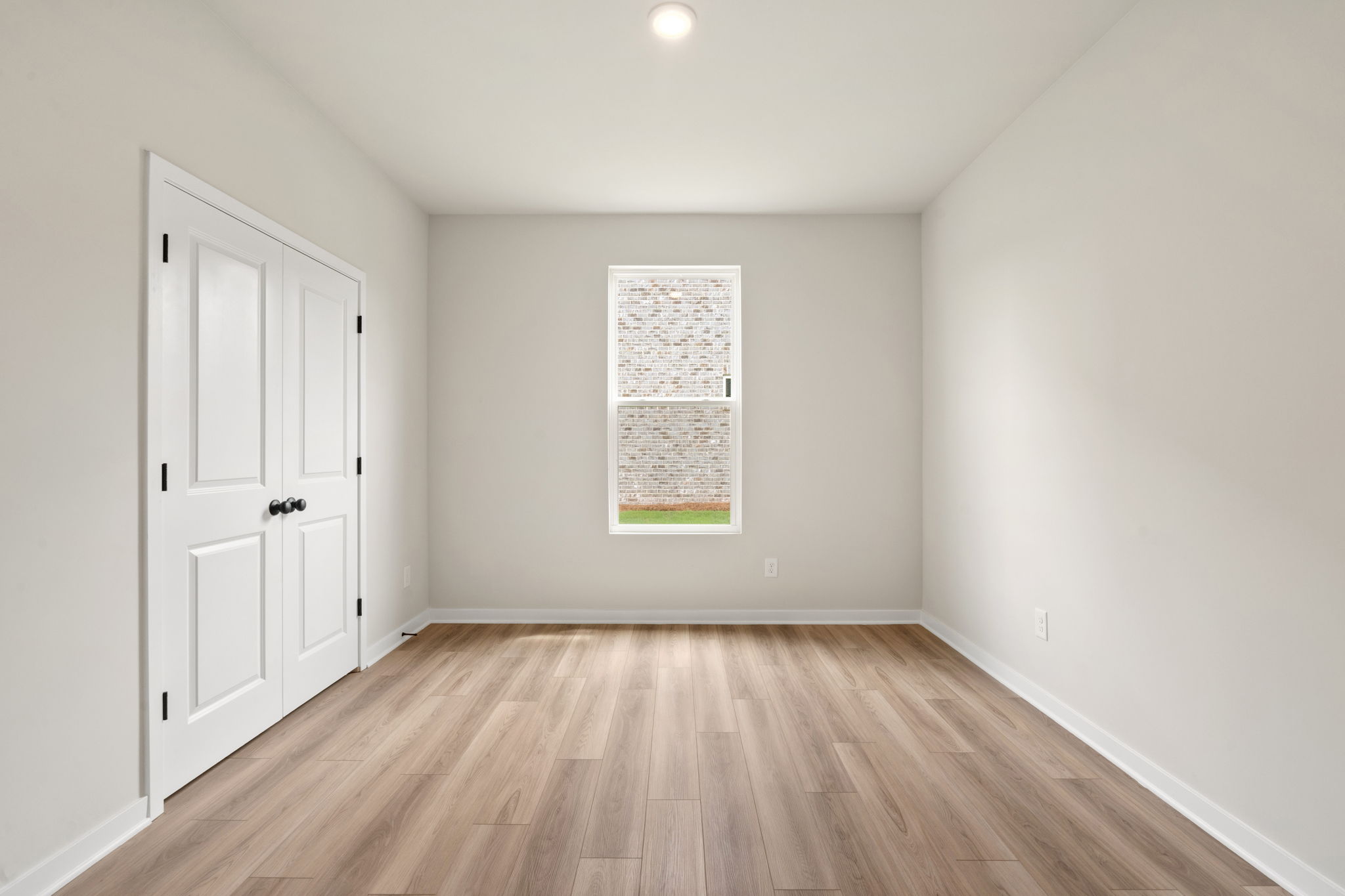 A room with white doors.