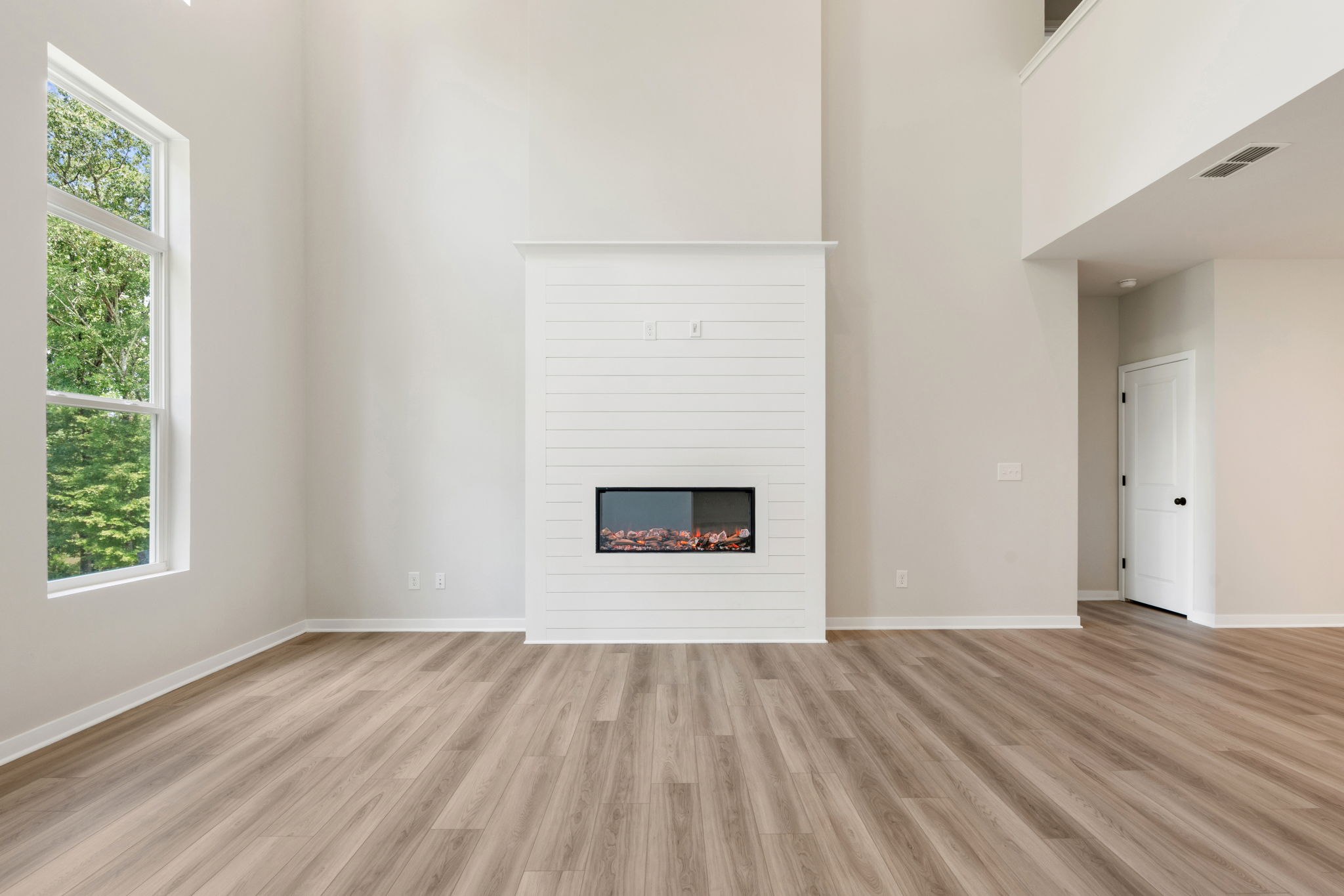 A fireplace in a room.