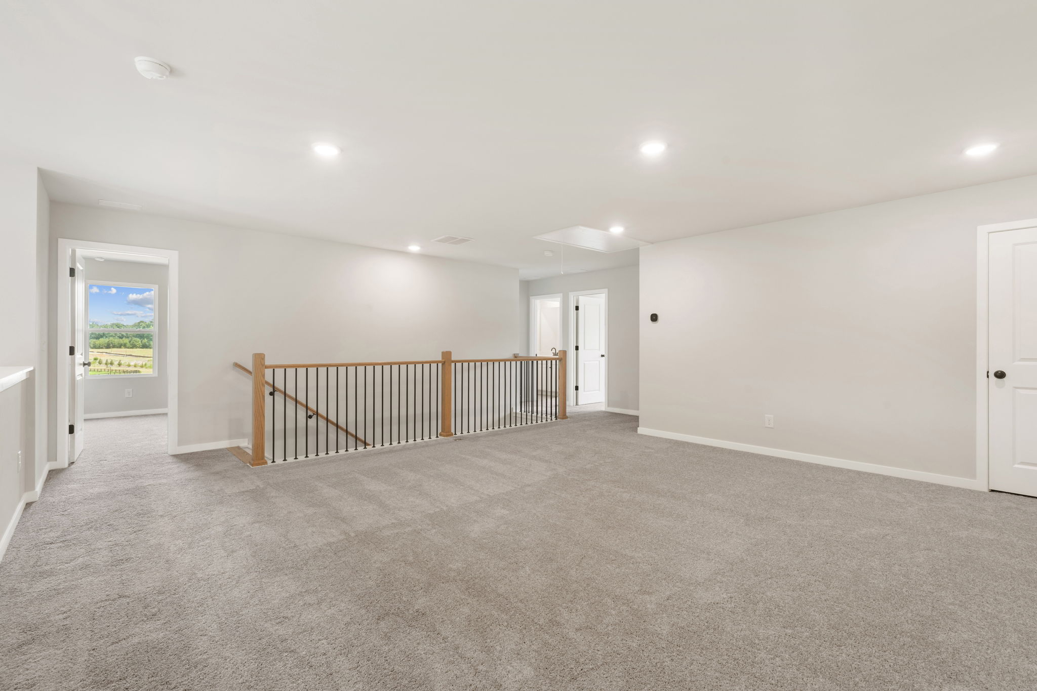 A room with a railing and a railing.