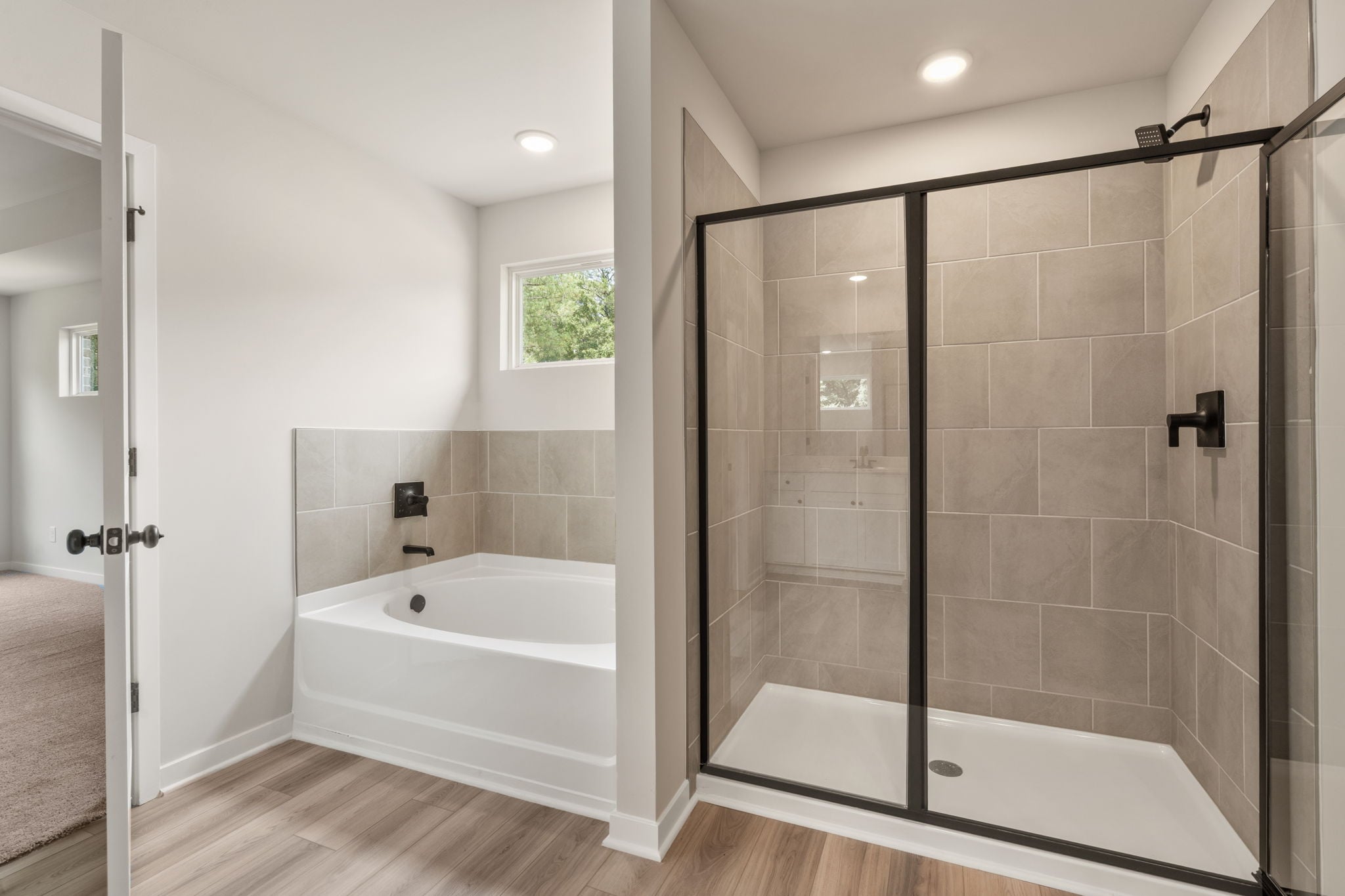 A bathroom with a glass shower.