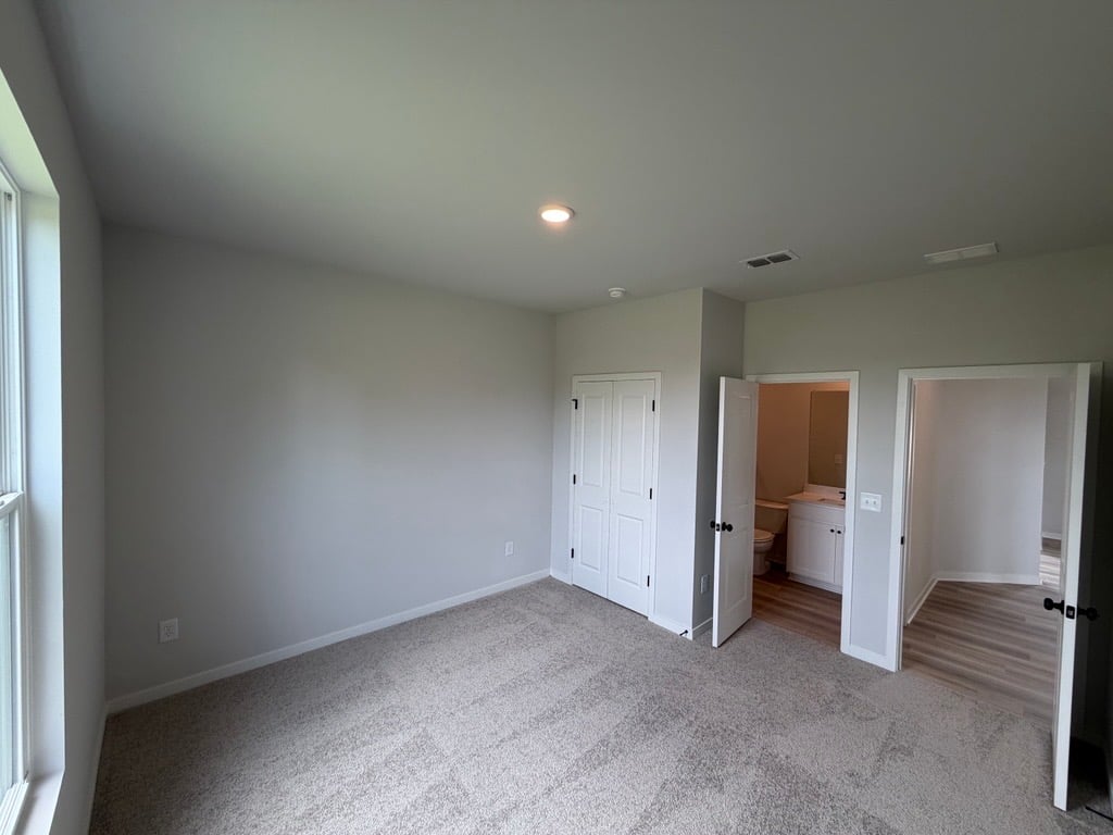 A room with white doors.