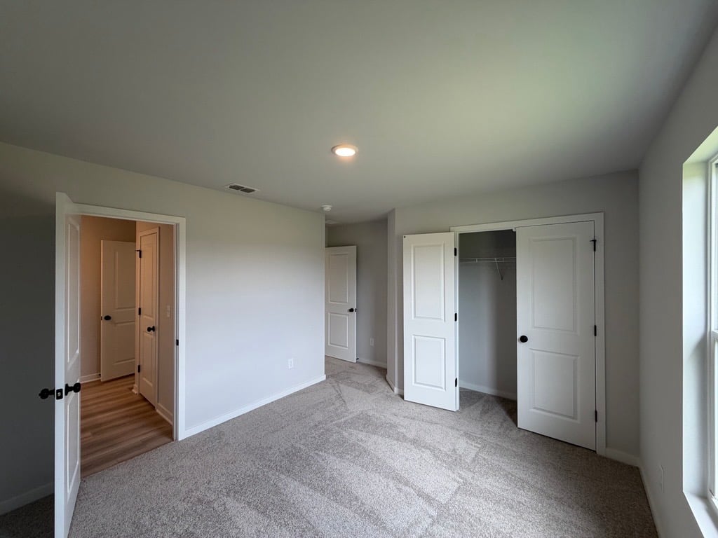A room with white doors.