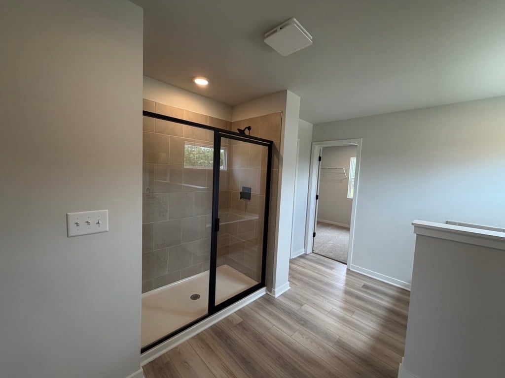 A room with a glass door.