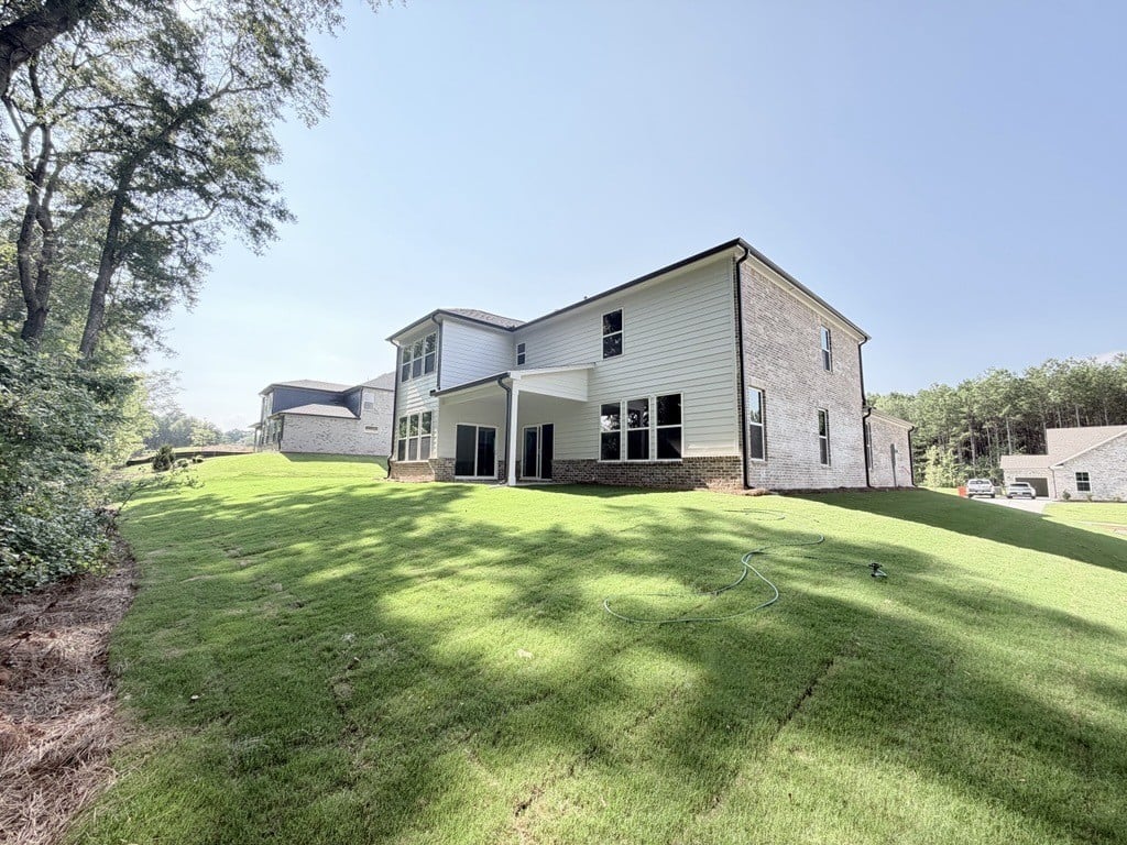 A house with a lawn.