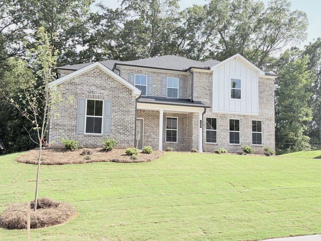 A house with a lawn.