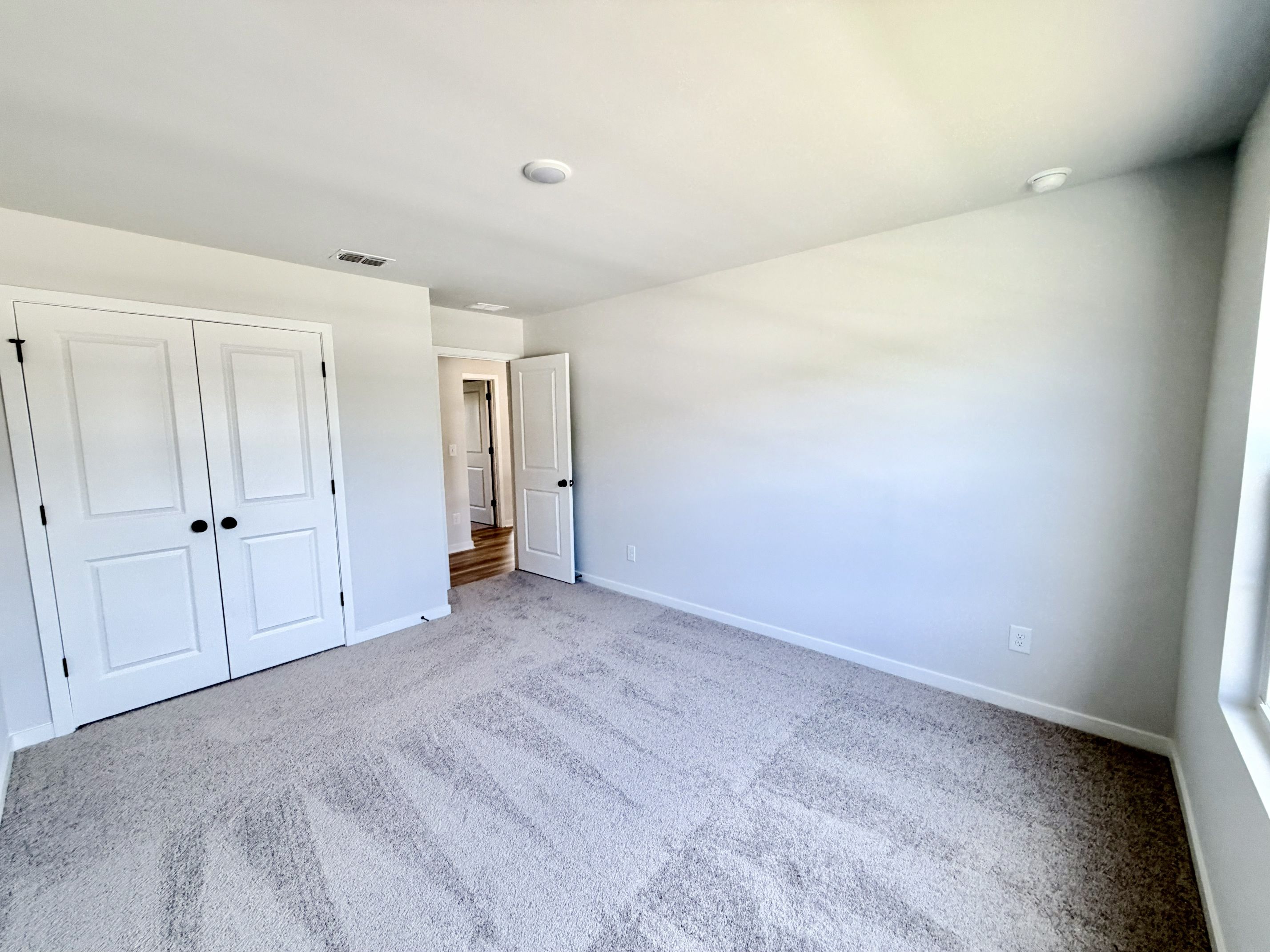A room with white doors.