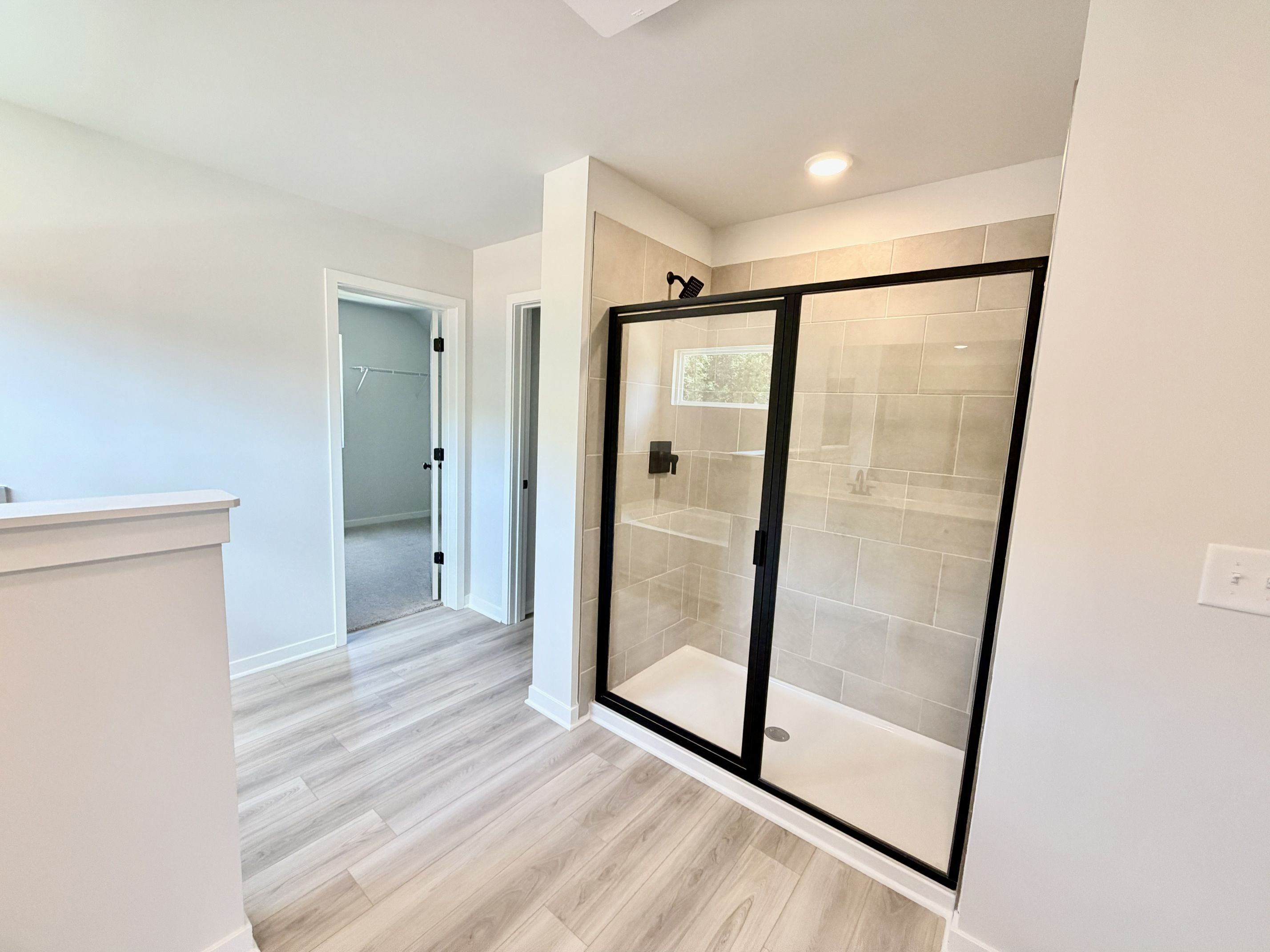 A room with a glass door.