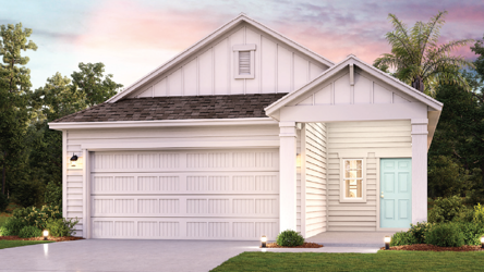 A white house with a garage.