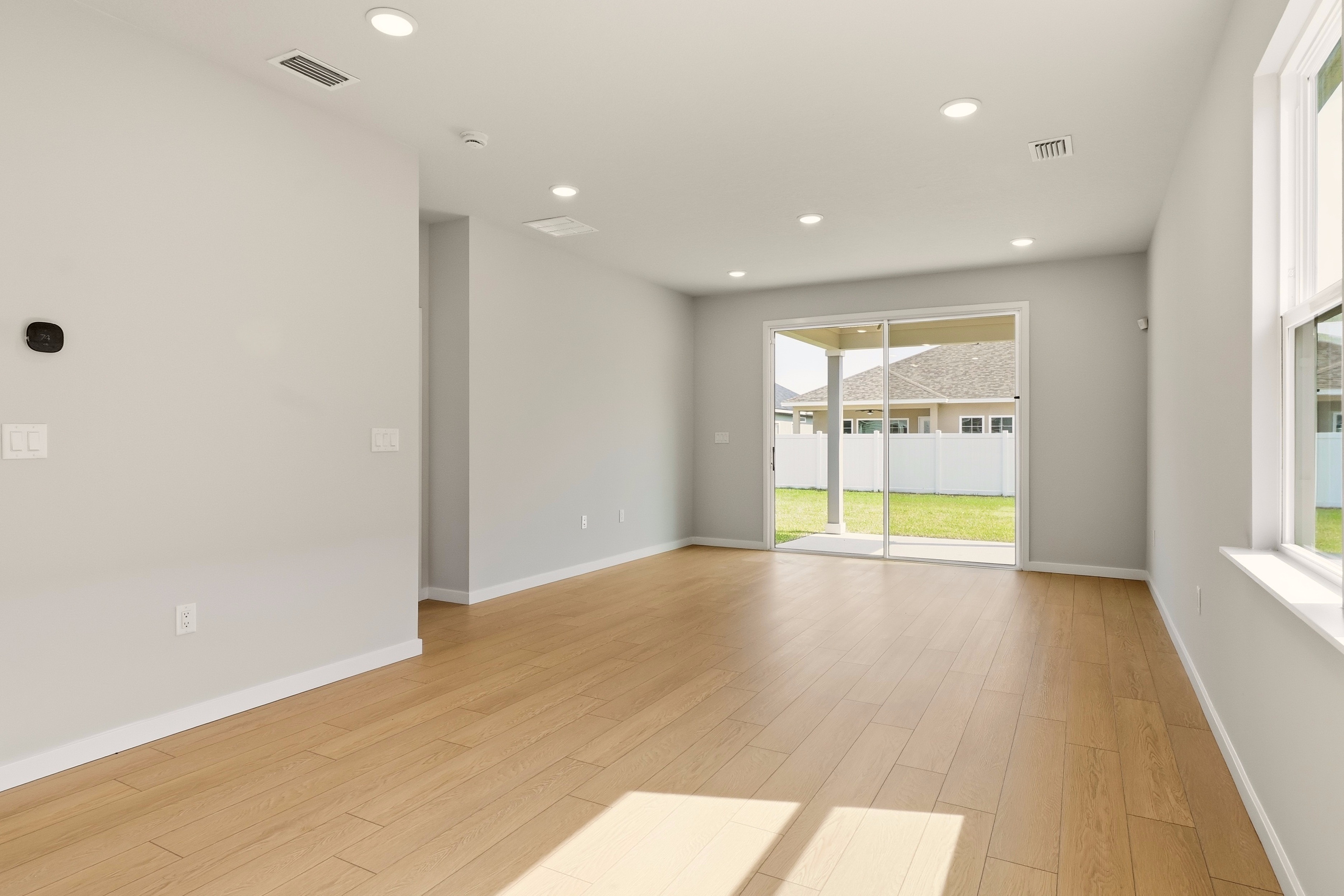 A room with a wood floor and a wood floor.