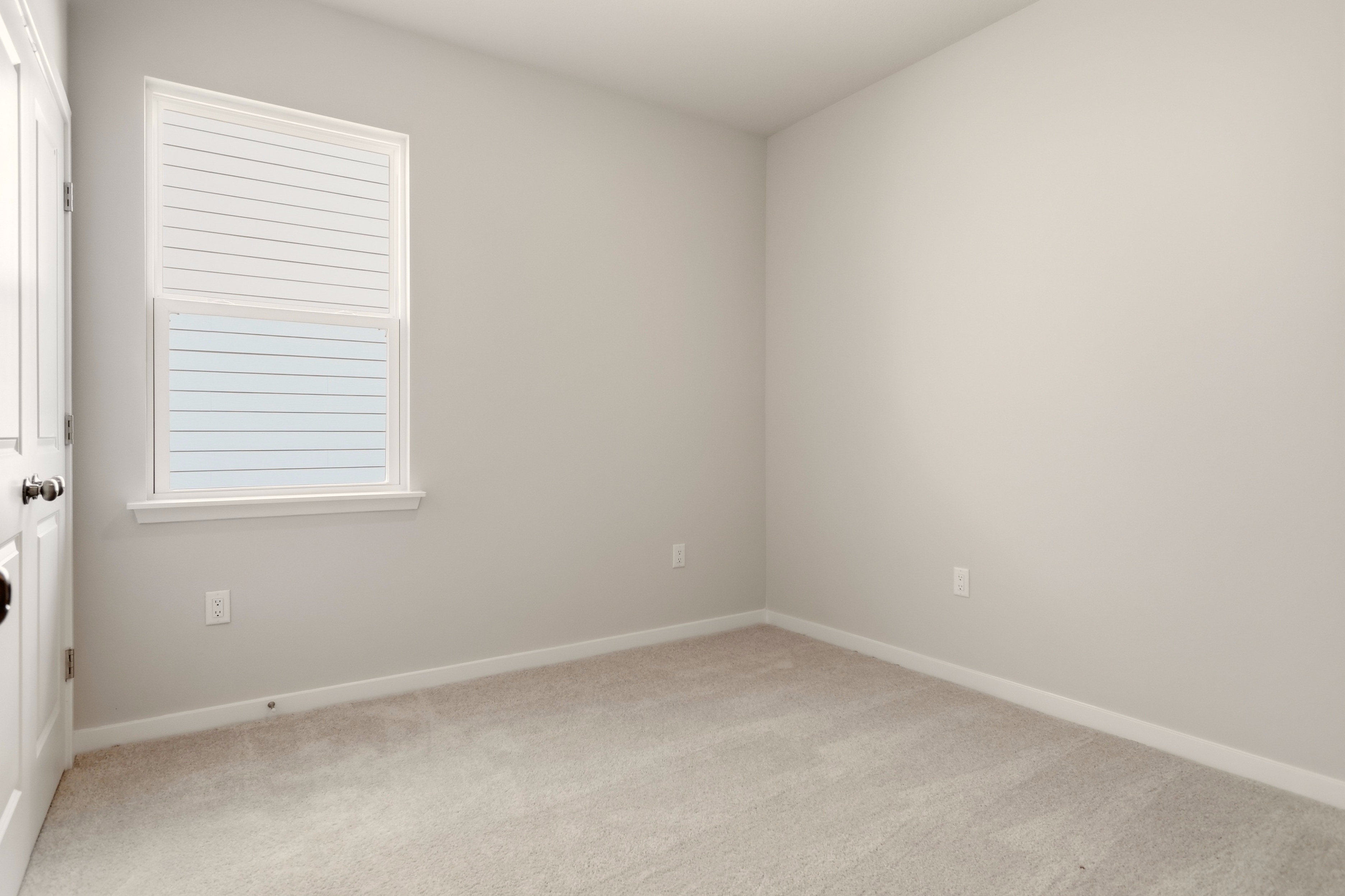 A room with white walls.